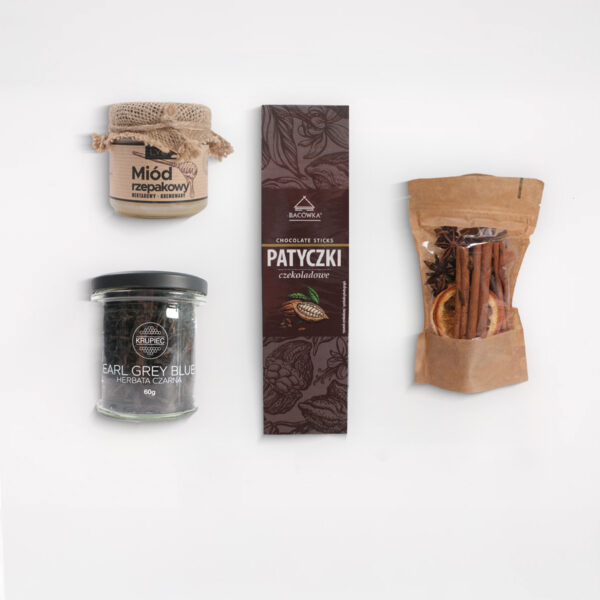 Produkty w zestawie herbata, miód , patyczki i susz